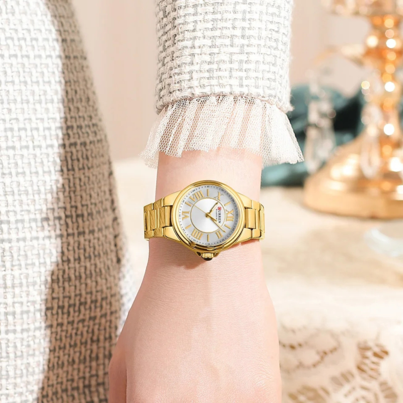 curren 9091 golden ladies watch for office wear